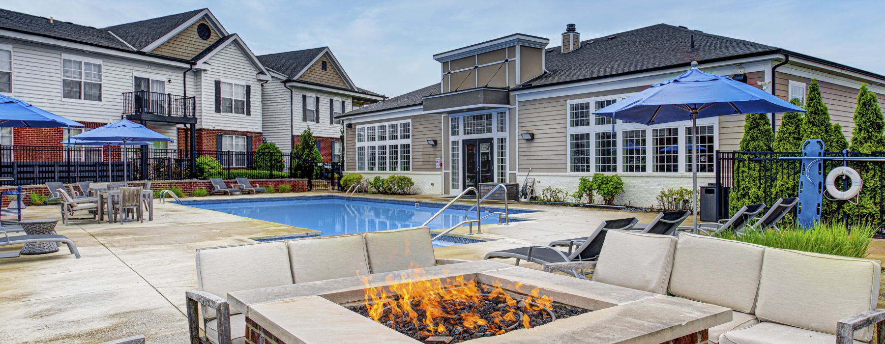 Swimming pool with sundeck and firepit