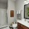 a bathroom with a sink toilet and a shower